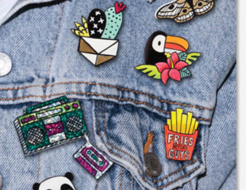 jean jacket decorated with shrink plastic pins