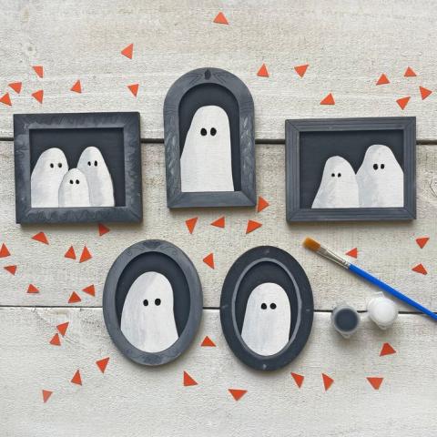 five miniature frames surrounding paintings of ghosts